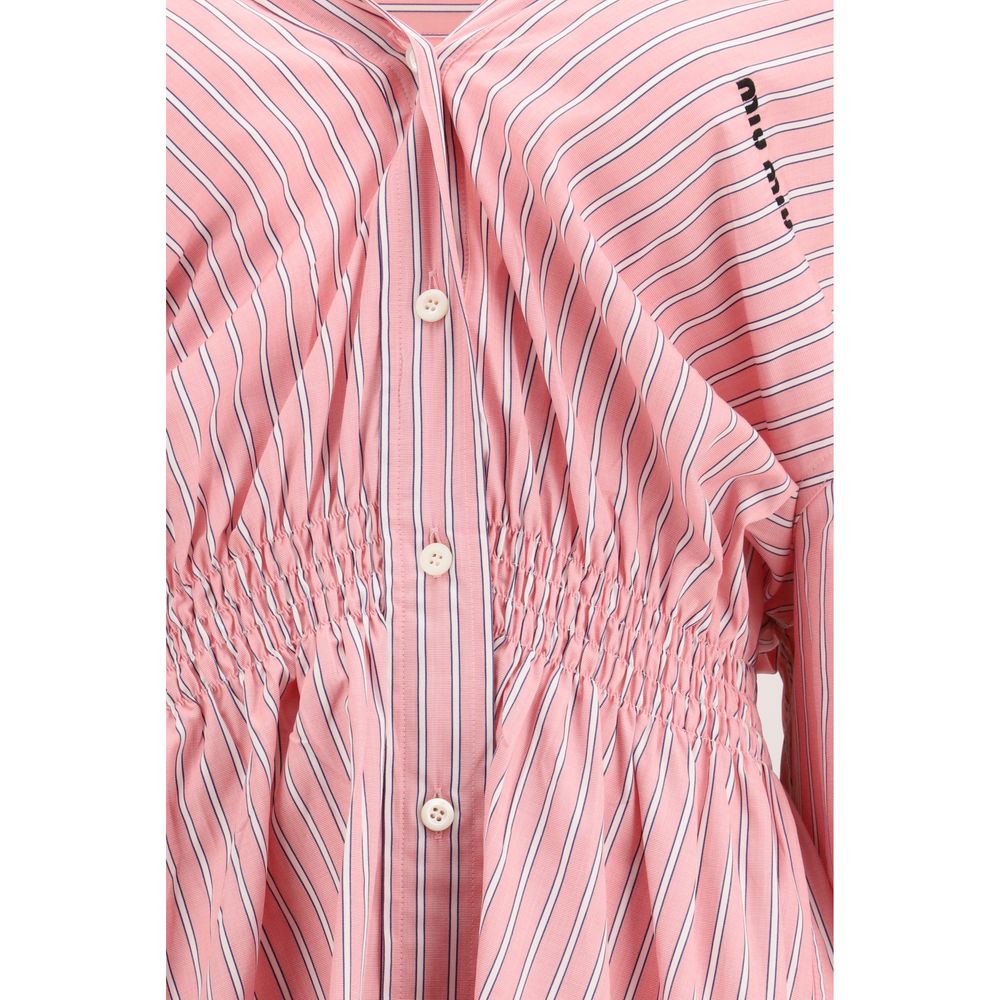 Elevate your elegance with the Miu Miu Multicolor Cotton Casual Dress, a masterpiece of exquisite craftsmanship and timeless allure, perfect for any sophisticated occasion.