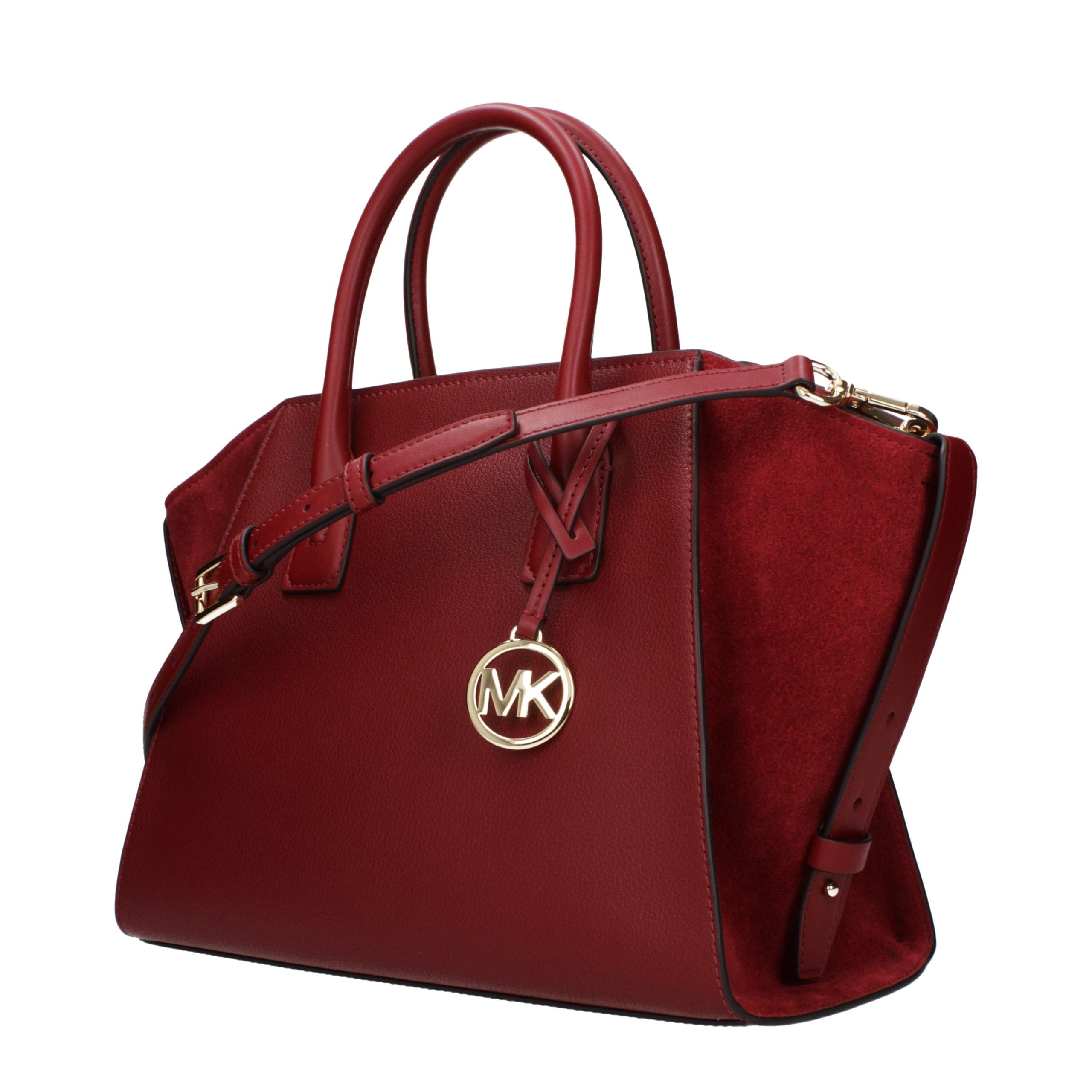 Elevate your elegance with the Michael Kors Red Leather Handbag, a masterpiece of exquisite craftsmanship and timeless allure, perfect for any sophisticated occasion.