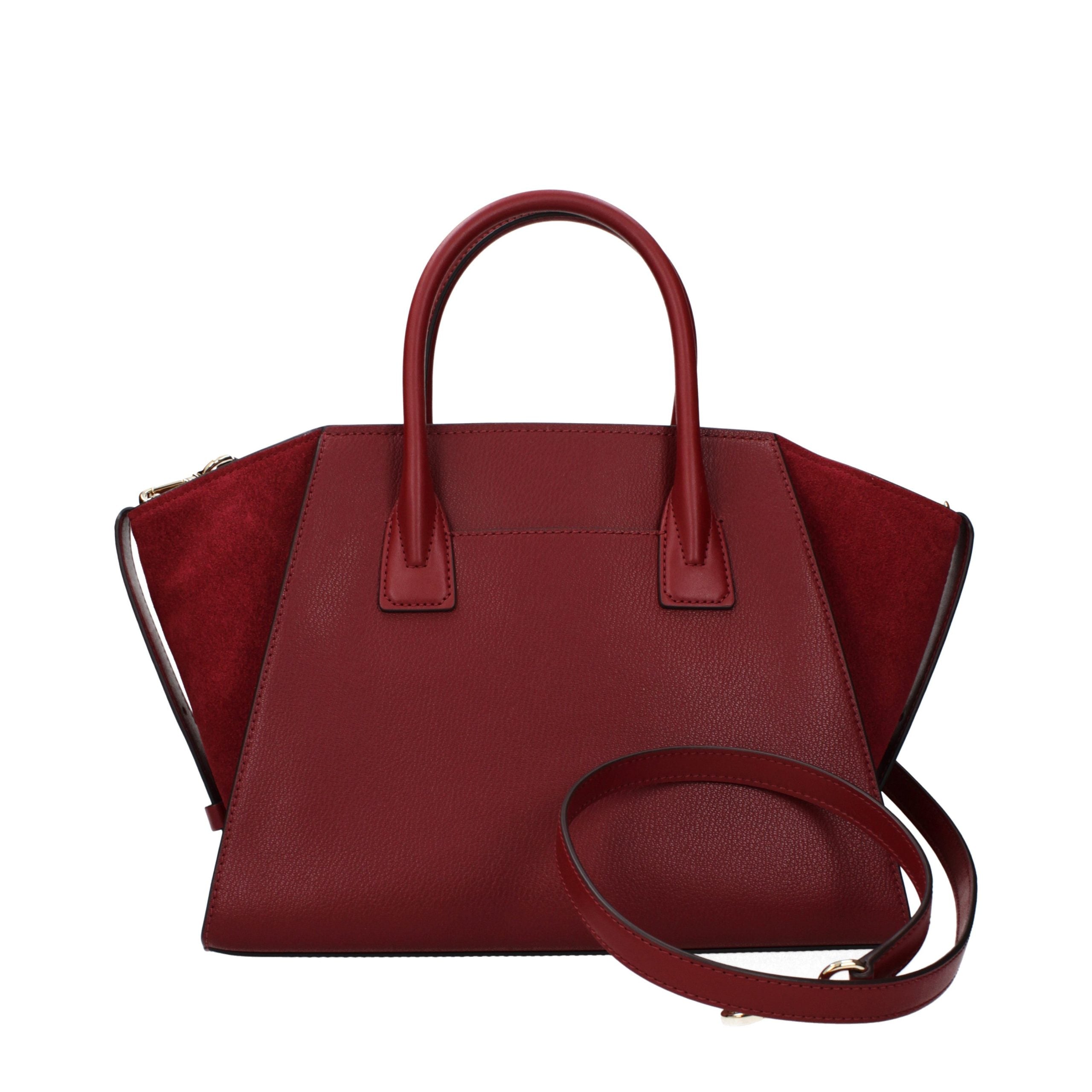 Discover the Michael Kors Red Leather Handbag, a symbol of artisanal luxury and timeless elegance, crafted from high-quality leather for the discerning individual.
