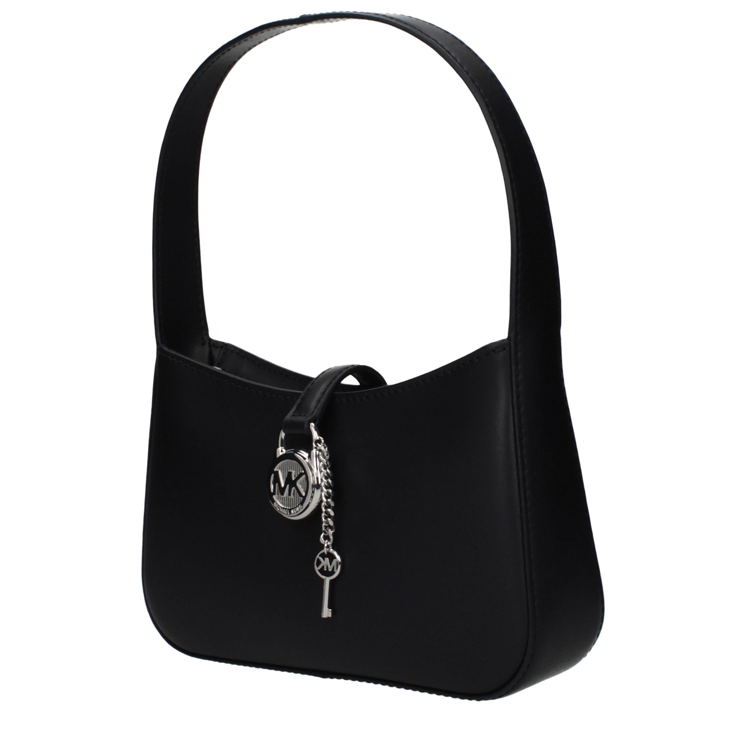 Discover the Michael Kors Black Leather Handbag, a timeless symbol of elegance crafted for those who embrace sophistication and style in every moment.