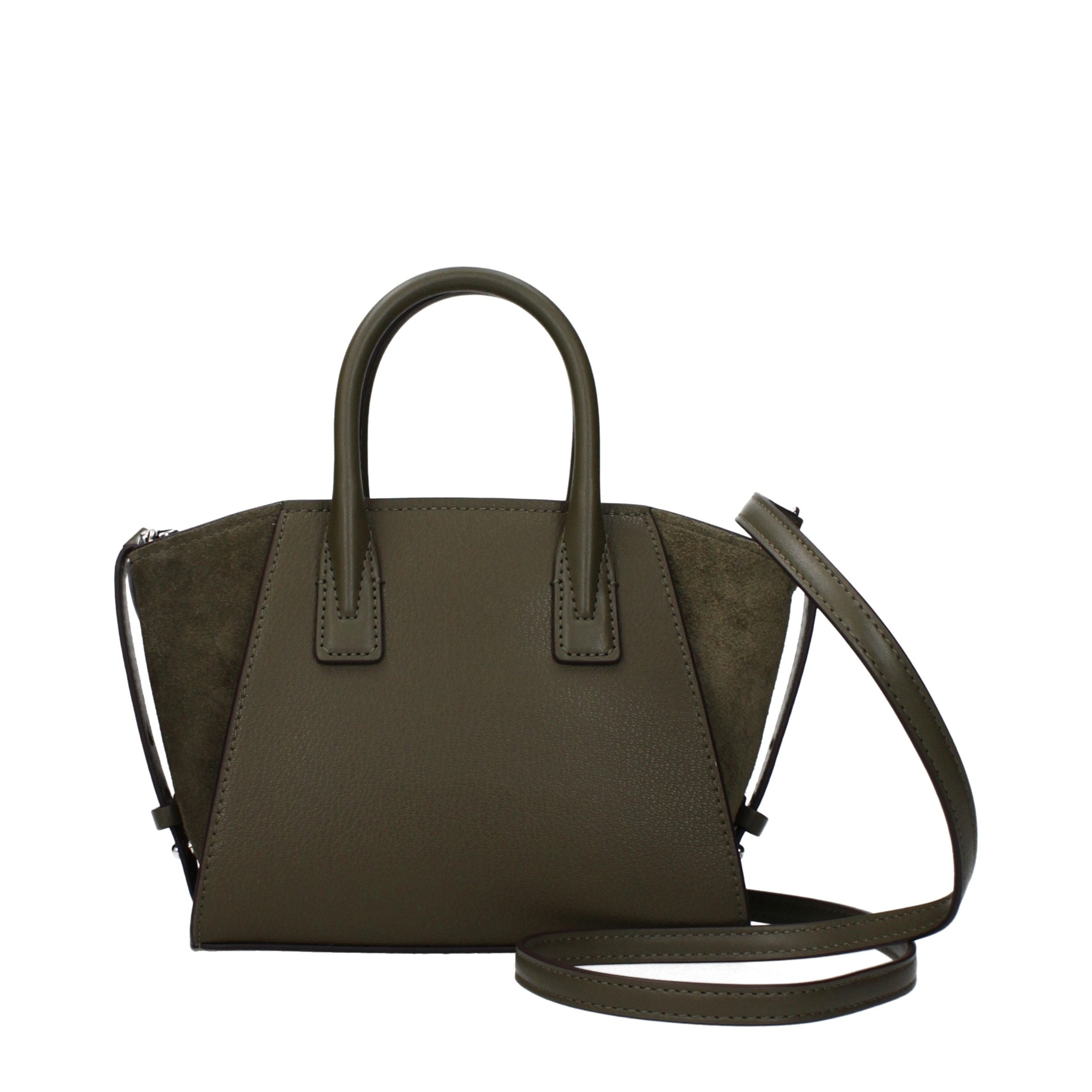 Experience the exquisite elegance of the Michael Kors Green Leather Handbag, a timeless masterpiece that embodies luxury and sophistication for every occasion.
