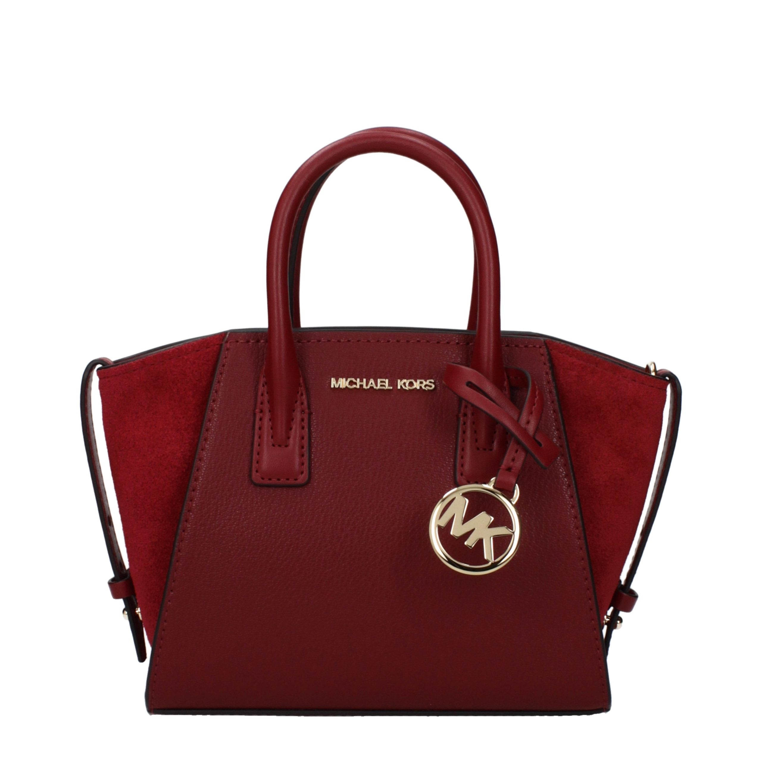 Elevate your elegance with the Michael Kors Red Leather Handbag, a masterpiece of luxurious craftsmanship designed for those who embody sophistication and style.