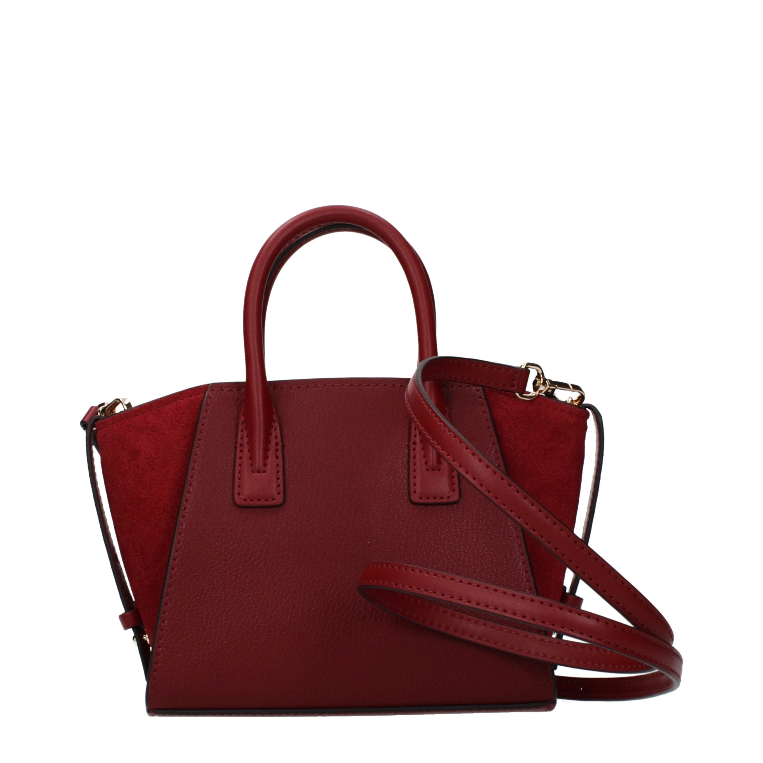 Experience the allure of the Michael Kors Red Leather Handbag, a masterpiece of craftsmanship that embodies timeless elegance and sophistication for every occasion.