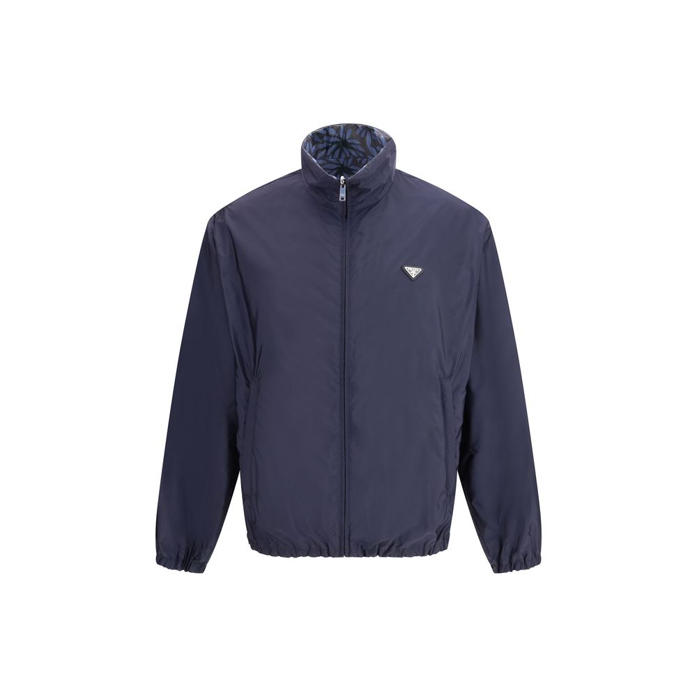 Discover the Prada Blue Recycled Polyamide Shell Jacket, a masterpiece of sustainable luxury, merging exquisite craftsmanship with timeless elegance for the discerning individual.