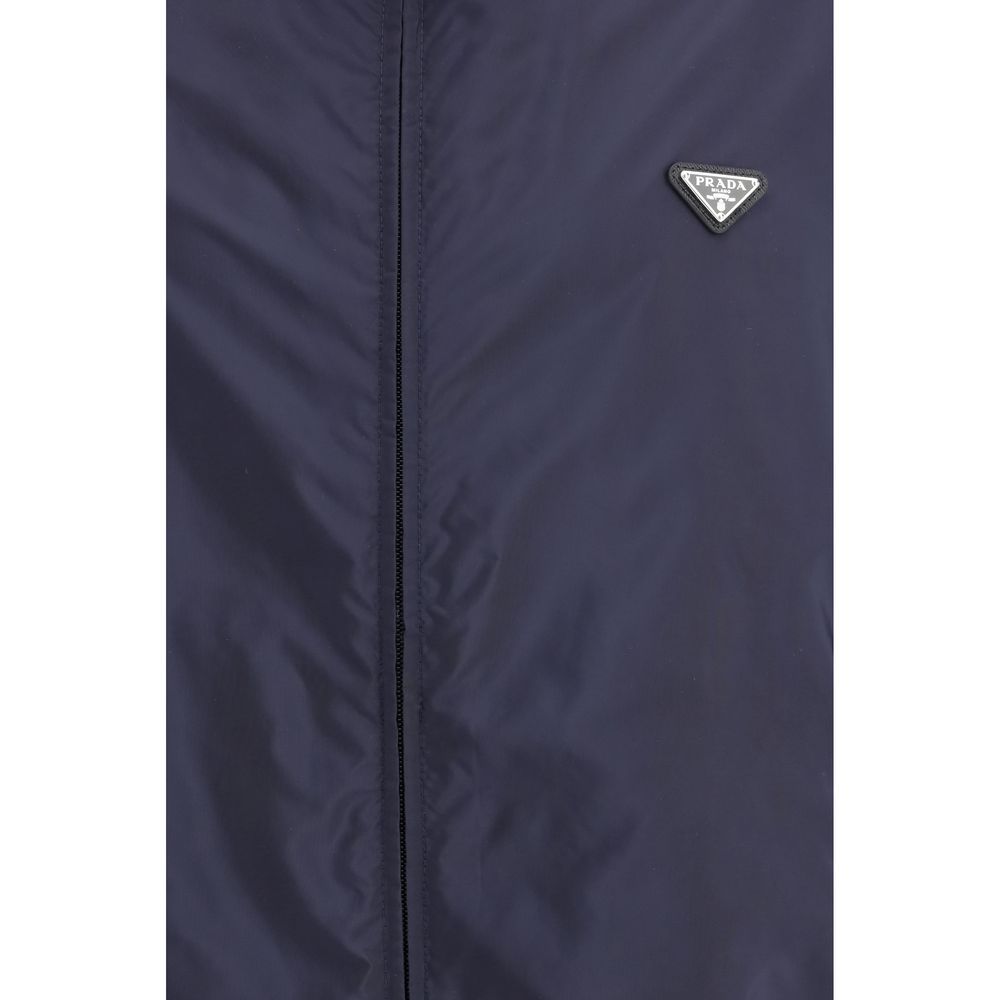Discover the Prada Blue Recycled Polyamide Shell Jacket, a masterpiece of sustainable luxury, blending exquisite craftsmanship with timeless elegance for the discerning individual.
