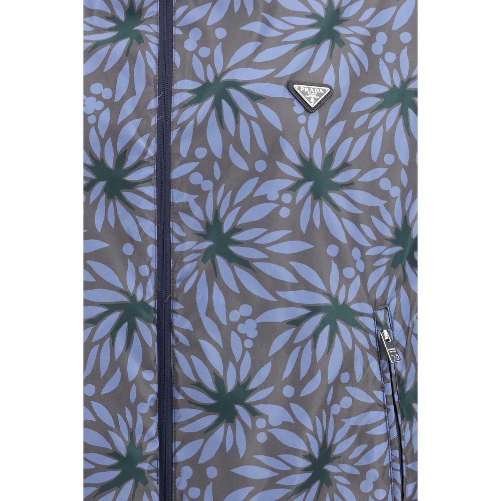 Discover the Prada Blue Recycled Polyamide Shell Jacket, where sustainable luxury meets exquisite craftsmanship, perfect for the discerning individual seeking timeless elegance.