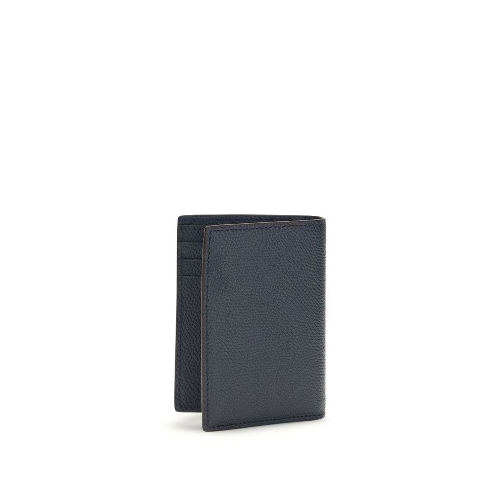 Discover the Valentino Garavani Blue Calf Leather Bos Taurus Wallet, a masterpiece of craftsmanship and elegance, perfect for those who appreciate luxury in every detail.