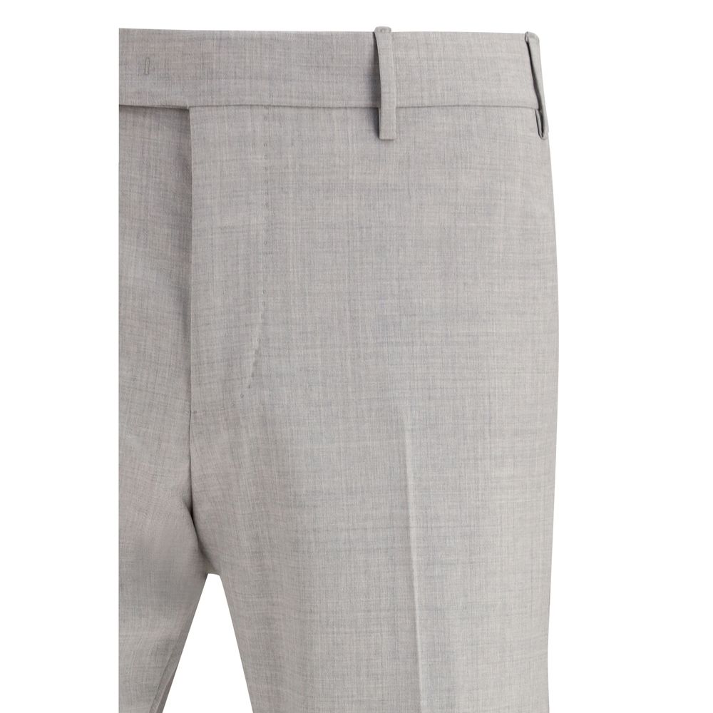 Elevate your wardrobe with the PT Torino Gray Wool Oves Aries Dress Pants, crafted from luxurious fleece wool for timeless elegance and effortless sophistication.