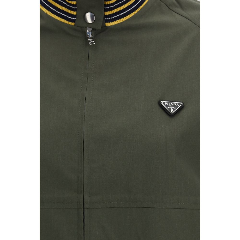 Elevate your wardrobe with the Prada Bicolor Polyester Bomber, a luxurious blend of sophistication and artistry, perfect for discerning individuals seeking timeless elegance.