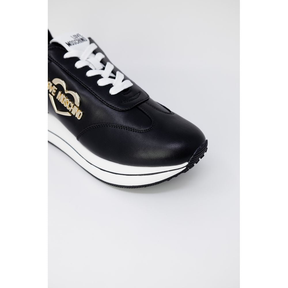 Experience the allure of Love Moschino Black Leather Low Top Sneakers, where exquisite craftsmanship meets urban elegance, perfect for the discerning individual.