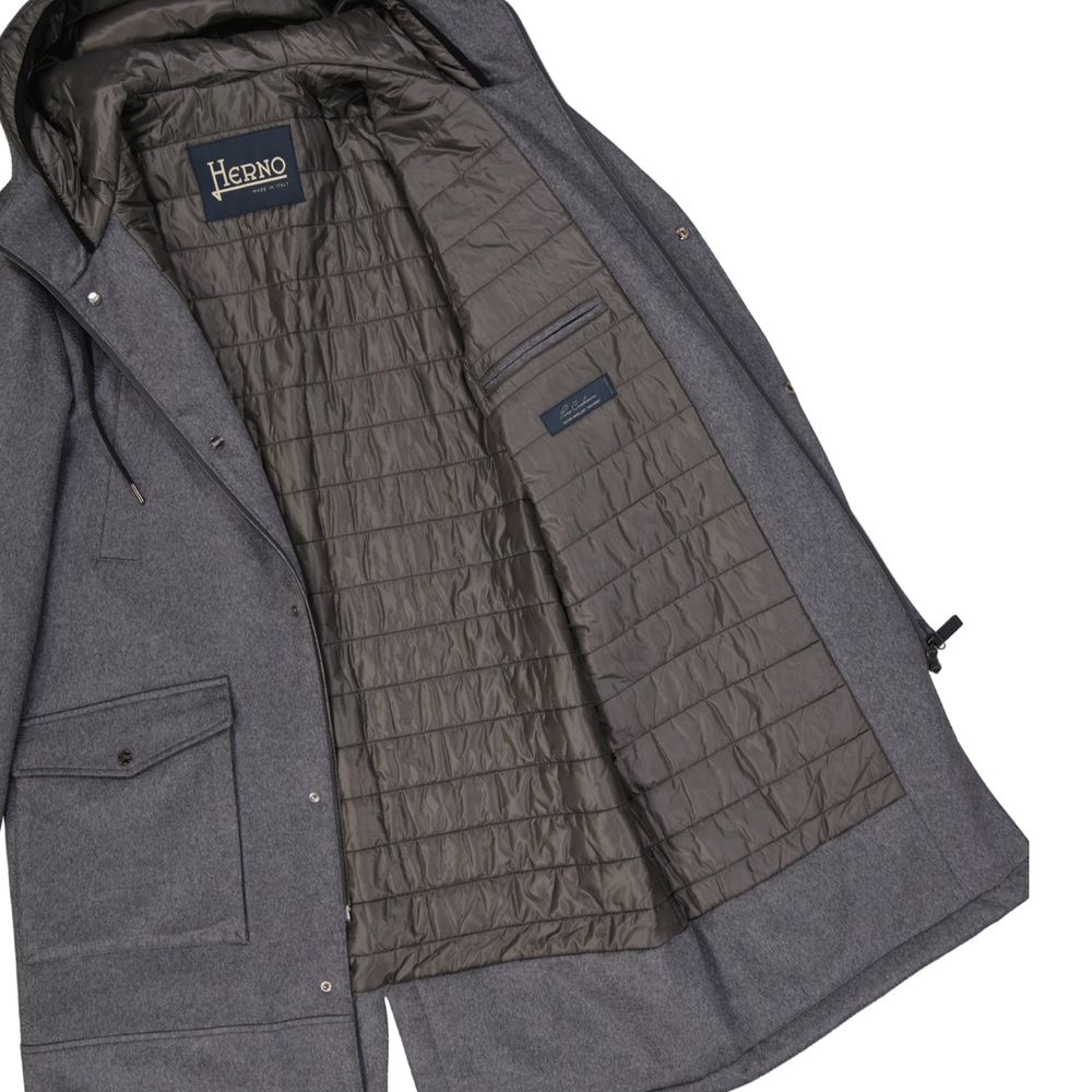 Indulge in the exquisite Herno Gray Cashmere Coat, a testament to Italian craftsmanship, blending luxurious cashmere with refined design for timeless elegance.