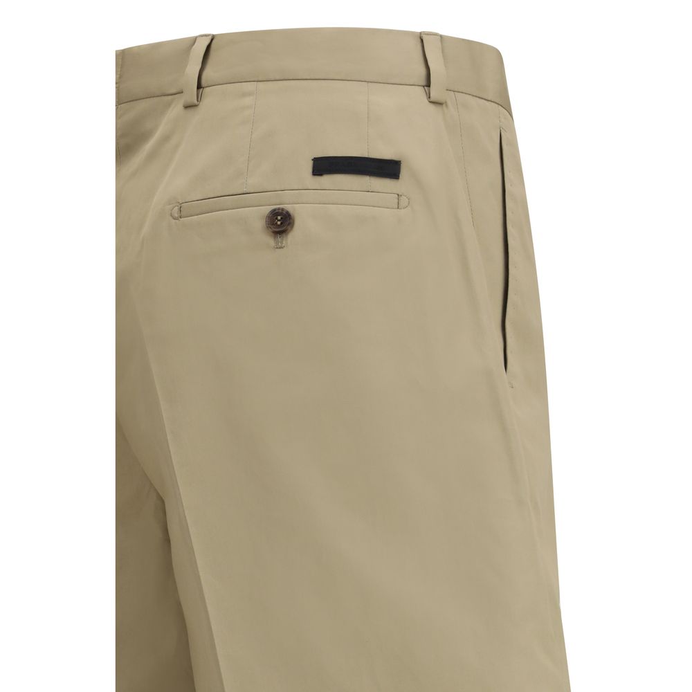 Discover the refined elegance of Prada Beige Cotton Shorts, crafted from premium cotton for a tailored fit that embodies timeless luxury and sophistication.