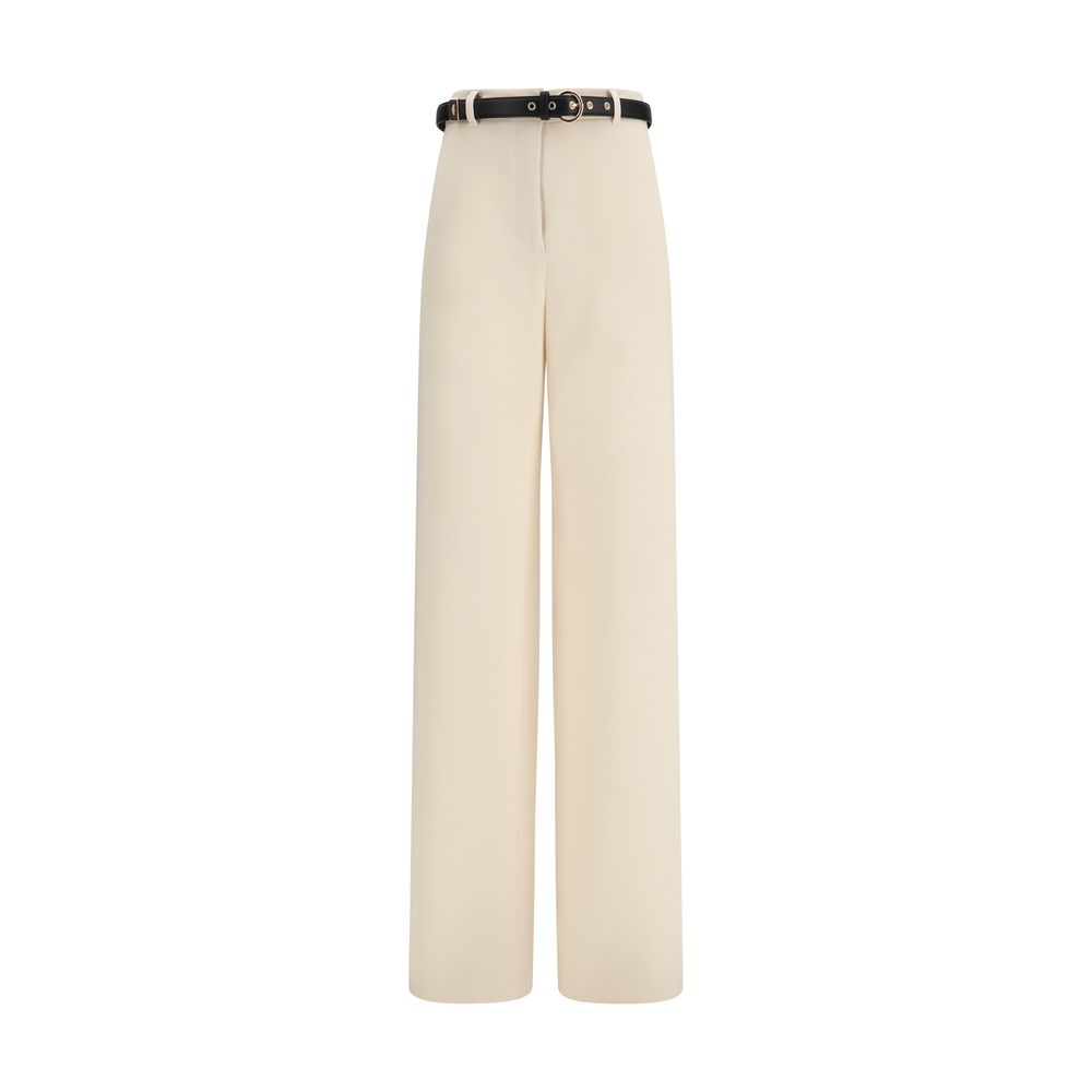 Experience the refined elegance of Max Mara's Beige Triacetate Dress Pants, crafted for the discerning individual who appreciates luxurious style and impeccable tailoring.