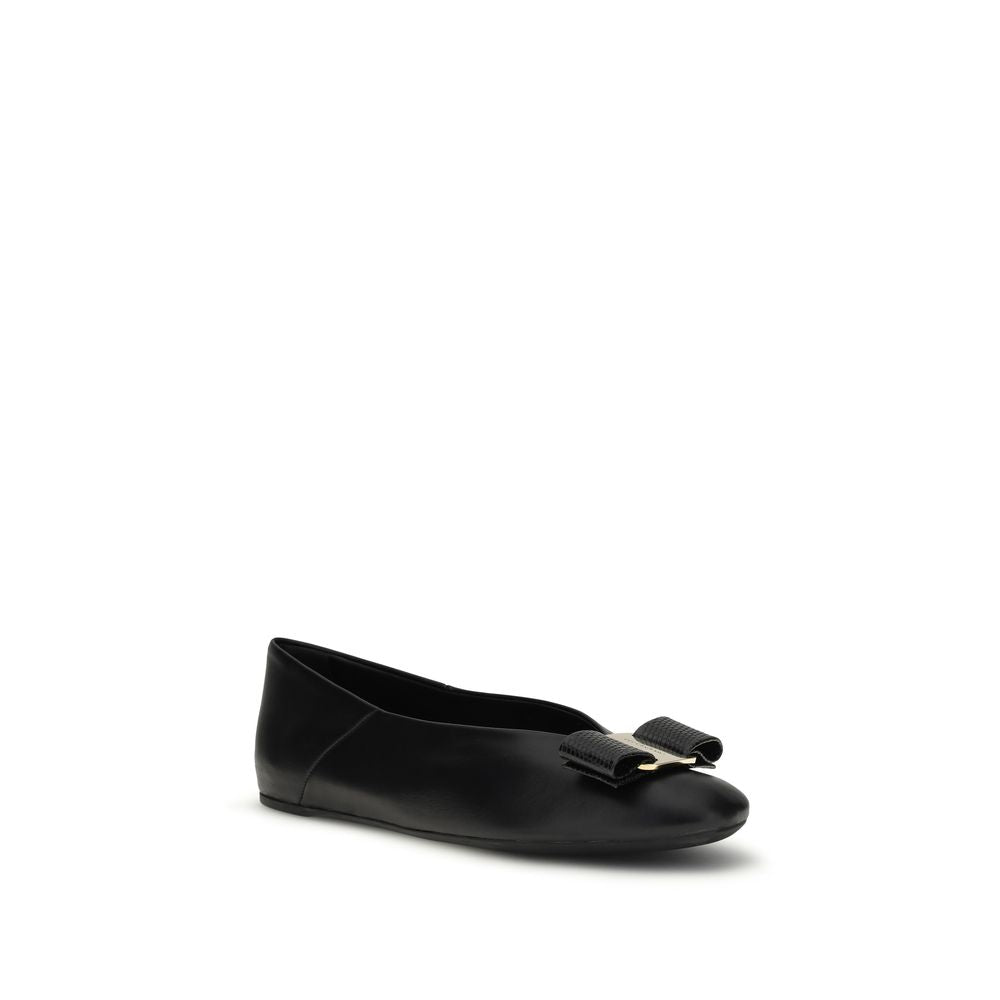 Discover the exquisite Ferragamo Black Calf Leather Bos Taurus Ballet Flats, where timeless elegance meets unparalleled craftsmanship for the discerning individual.