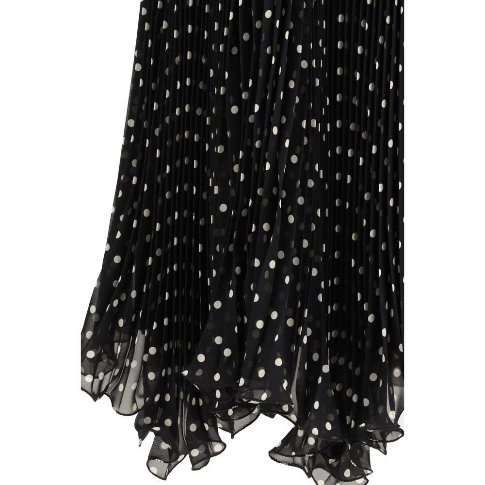 Elevate your wardrobe with the Valentino Black Viscose Midi Skirt, a masterpiece of Italian craftsmanship featuring playful polka dots and an elegant asymmetric hem.