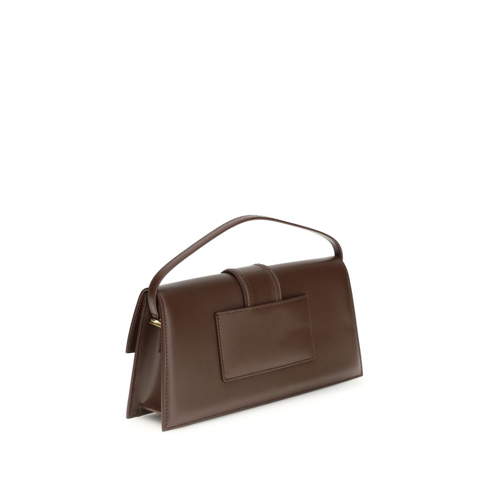 Discover the Jacquemus Brown Calf Leather Bos Taurus Shoulder Bag, a luxurious blend of exquisite glacé leather and refined craftsmanship, perfect for the modern connoisseur.