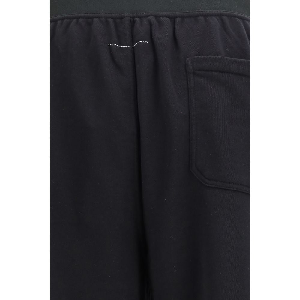 Elevate your wardrobe with MM6 Black Cotton Athletic Pants from the SS26 collection, where luxurious cotton meets modern design for timeless sophistication and effortless style.