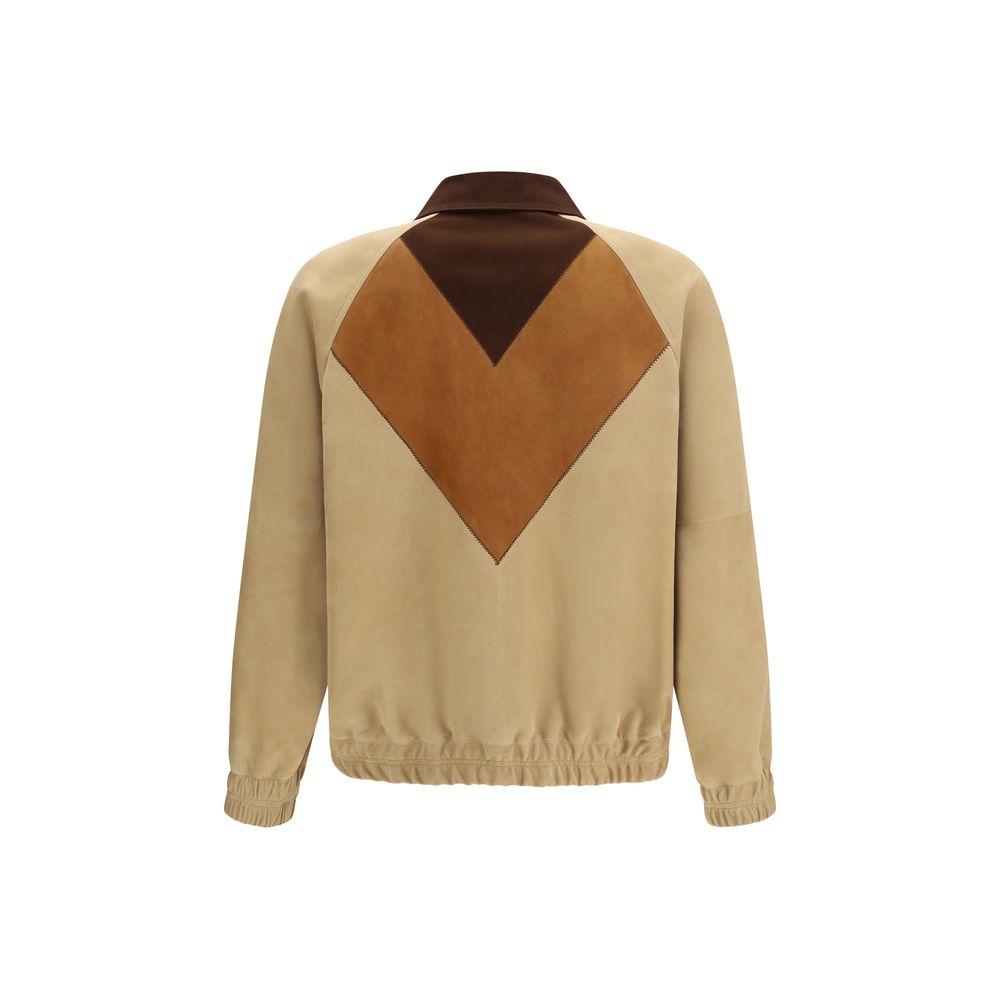 Discover the Valentino Brown Leather Jacket from the SS26 collection, crafted in luxurious goatskin, embodying sophistication and modern elegance for the discerning individual.