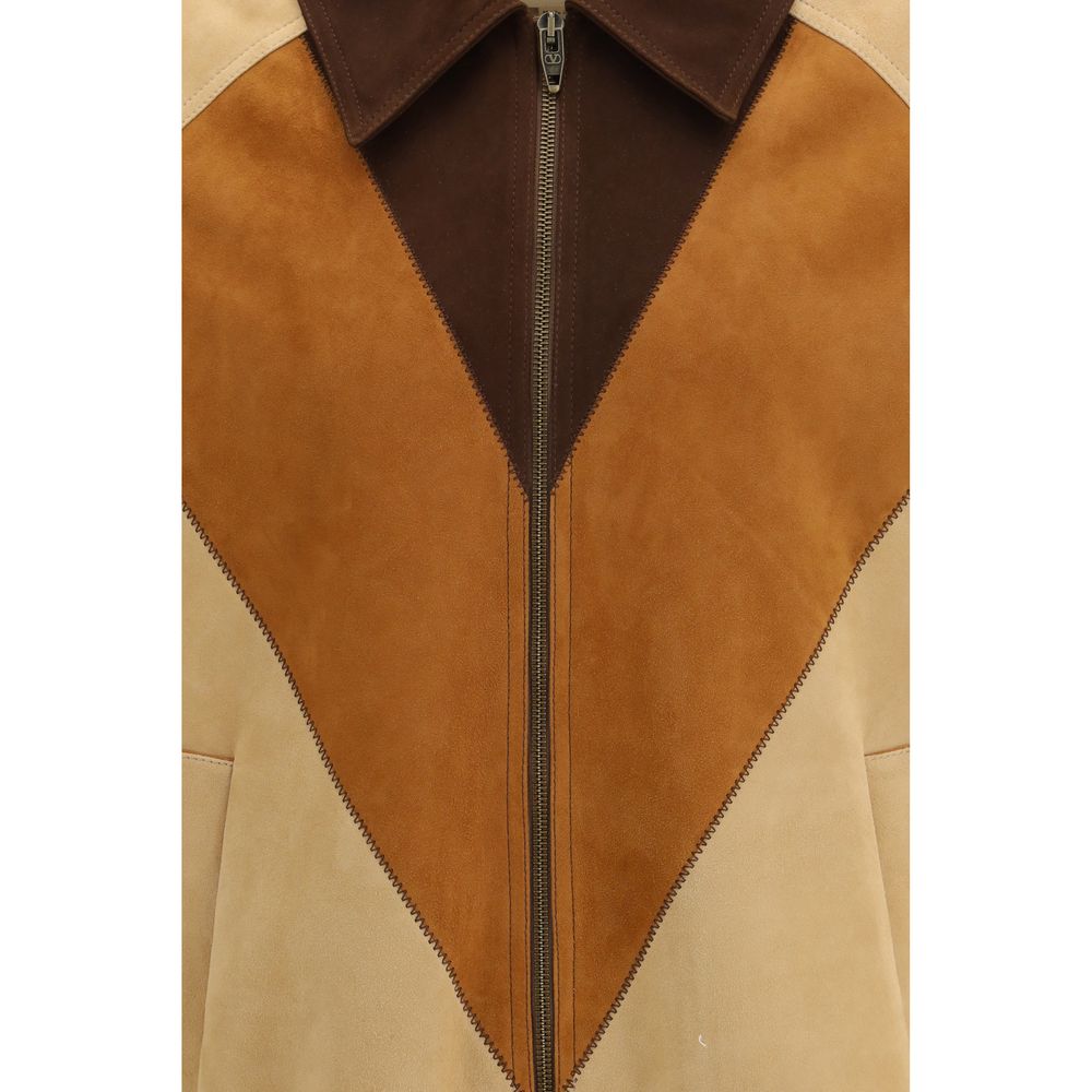 Elevate your style with the Valentino Brown Leather Jacket, crafted from luxurious goatskin, embodying sophistication and modern elegance for the discerning individual.