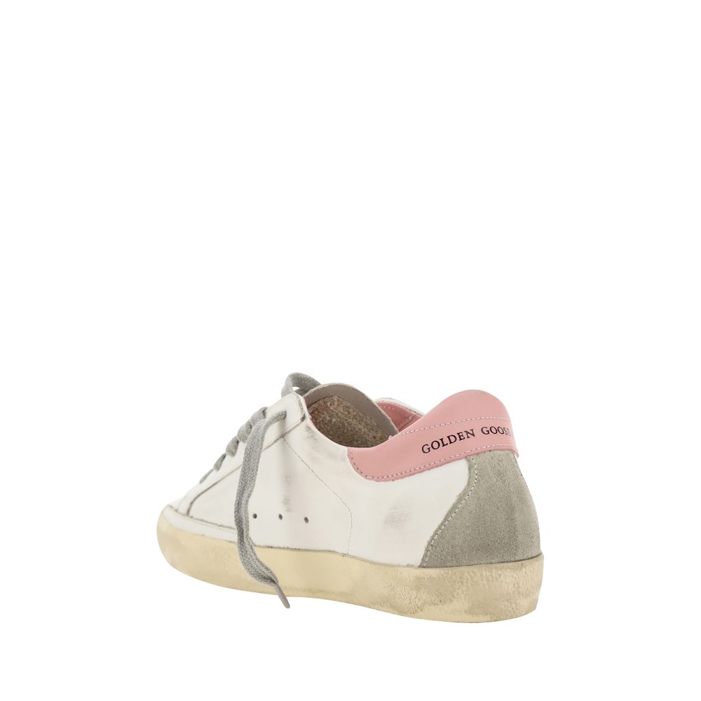 Indulge in the exquisite allure of Golden Goose White Calf Leather Bos Taurus Low Top Sneakers, where artisanal craftsmanship meets timeless style for the discerning connoisseur.