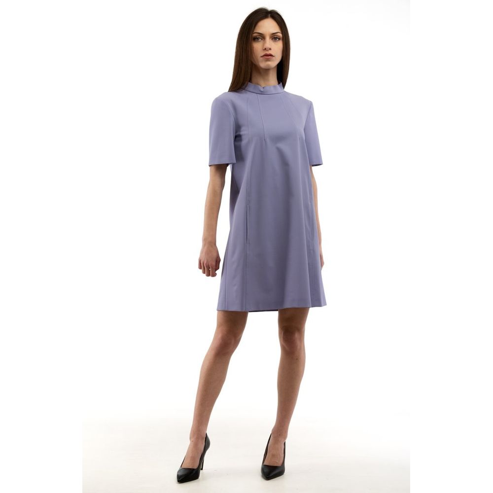 Elevate your wardrobe with the Moschino Purple Polyester Casual Dress, a harmonious blend of luxury and comfort, crafted to embody elegance and individuality.