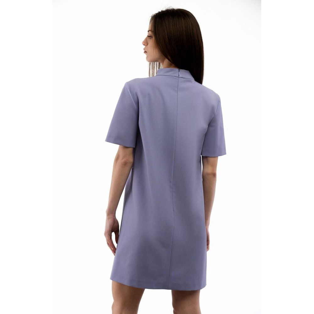 Elevate your wardrobe with the Moschino Purple Polyester Casual Dress, a luxurious blend of elegance and comfort, perfect for any sophisticated occasion.