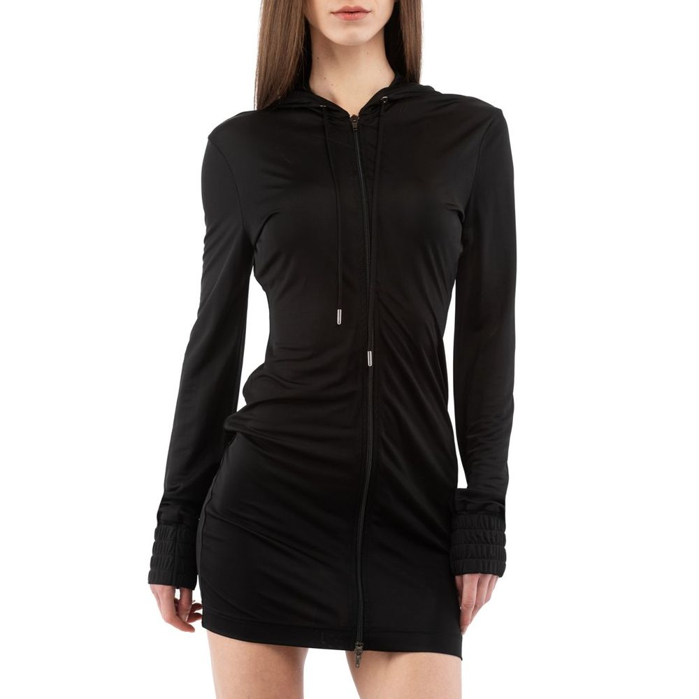 Indulge in the exquisite Moschino Black Viscose Casual Dress, a timeless piece crafted from luxurious viscose, embodying elegance and sophistication for every occasion.