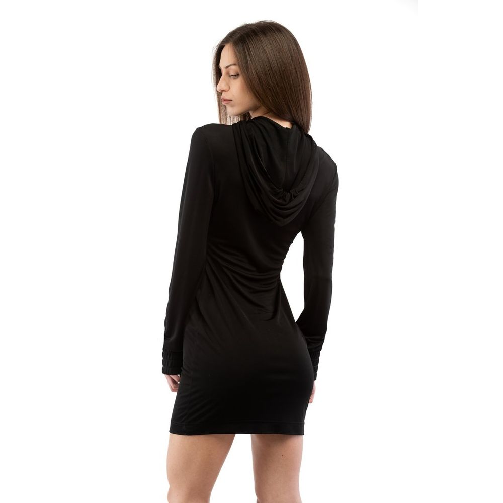 Indulge in the exquisite Moschino Black Viscose Casual Dress, a timeless piece crafted from sumptuous viscose, embodying elegance and sophistication for every occasion.