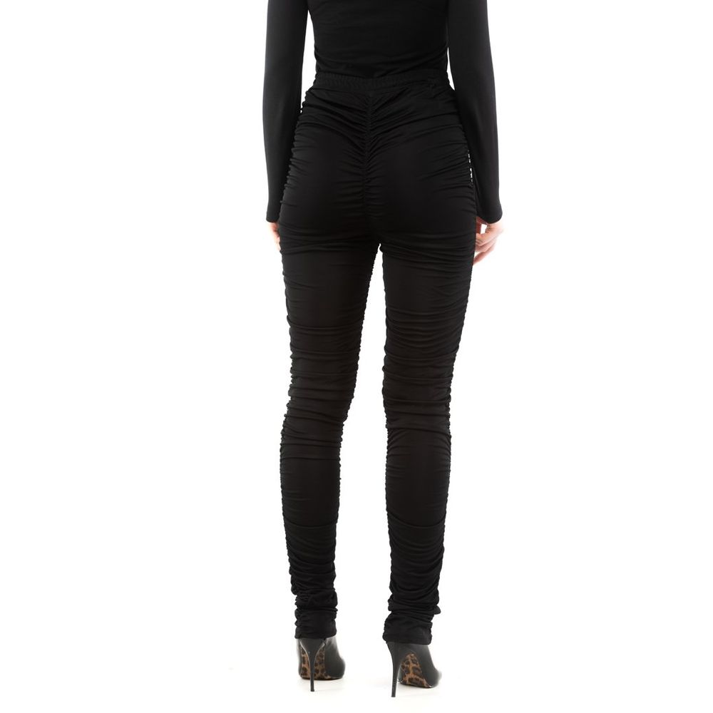 Indulge in the exquisite allure of Moschino's Black Viscose Casual Pants, where luxurious craftsmanship meets timeless elegance, perfect for any discerning wardrobe.