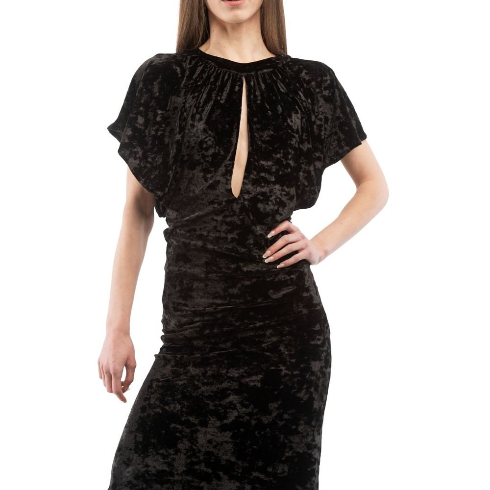 Discover the Moschino Black Polyester Casual Dress, a masterclass in elegance and versatility, expertly crafted for those who embrace luxury and sophistication.