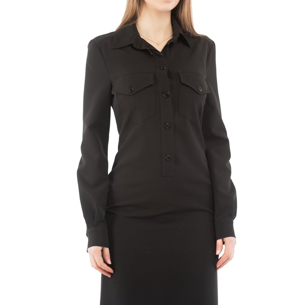 Elevate your wardrobe with the Moschino Black Polyester Casual Dress, a masterpiece of Italian craftsmanship that embodies luxury and effortless elegance for any occasion.