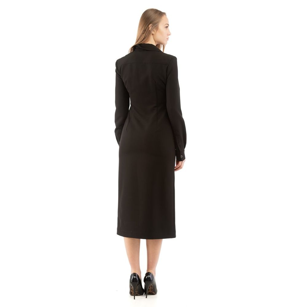 Elevate your wardrobe with the Moschino Black Polyester Casual Dress, a masterpiece of Italian craftsmanship that embodies luxury and effortless elegance for any occasion.
