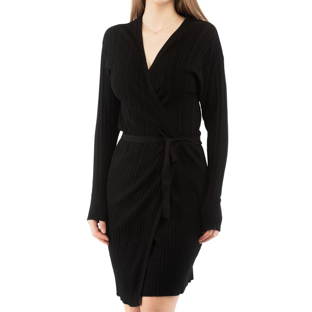 Discover the Moschino Black Viscose Casual Dress, a luxurious blend of elegance and comfort, perfect for any occasion, embodying timeless sophistication.