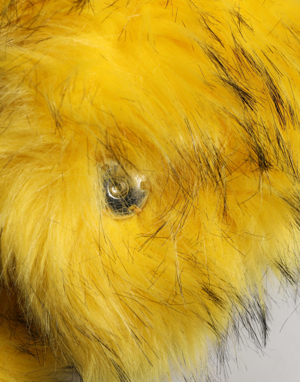 Elevate your winter wardrobe with the Dolce & Gabbana Yellow Modacrylic Fur Bucket Hat, a luxurious blend of warmth and style, crafted in Italy for the discerning fashion lover.