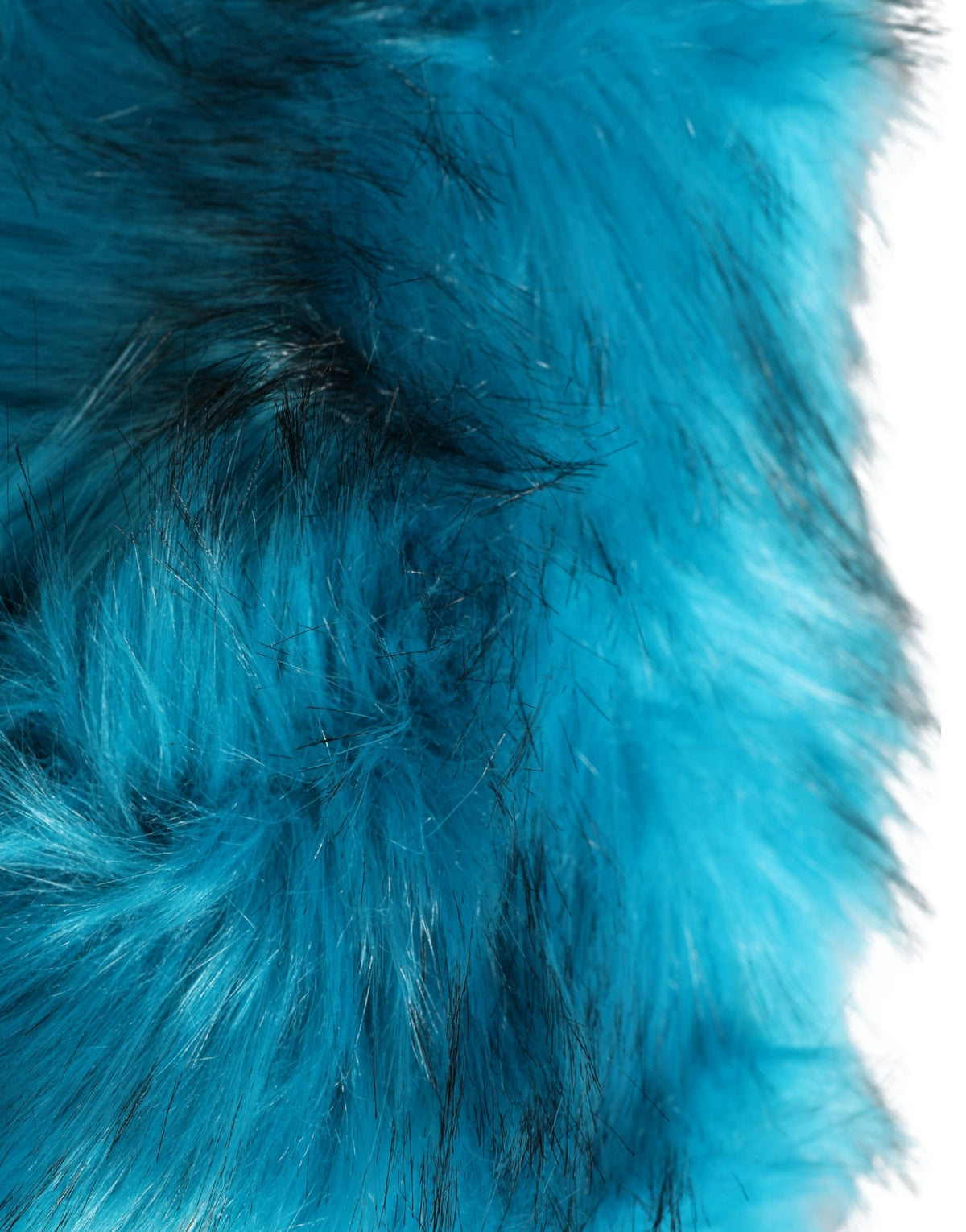 Indulge in the exquisite Dolce & Gabbana Blue Modacrylic Fur Bucket Hat, a luxurious statement piece crafted in Italy, blending warmth and elegance for discerning tastes.
