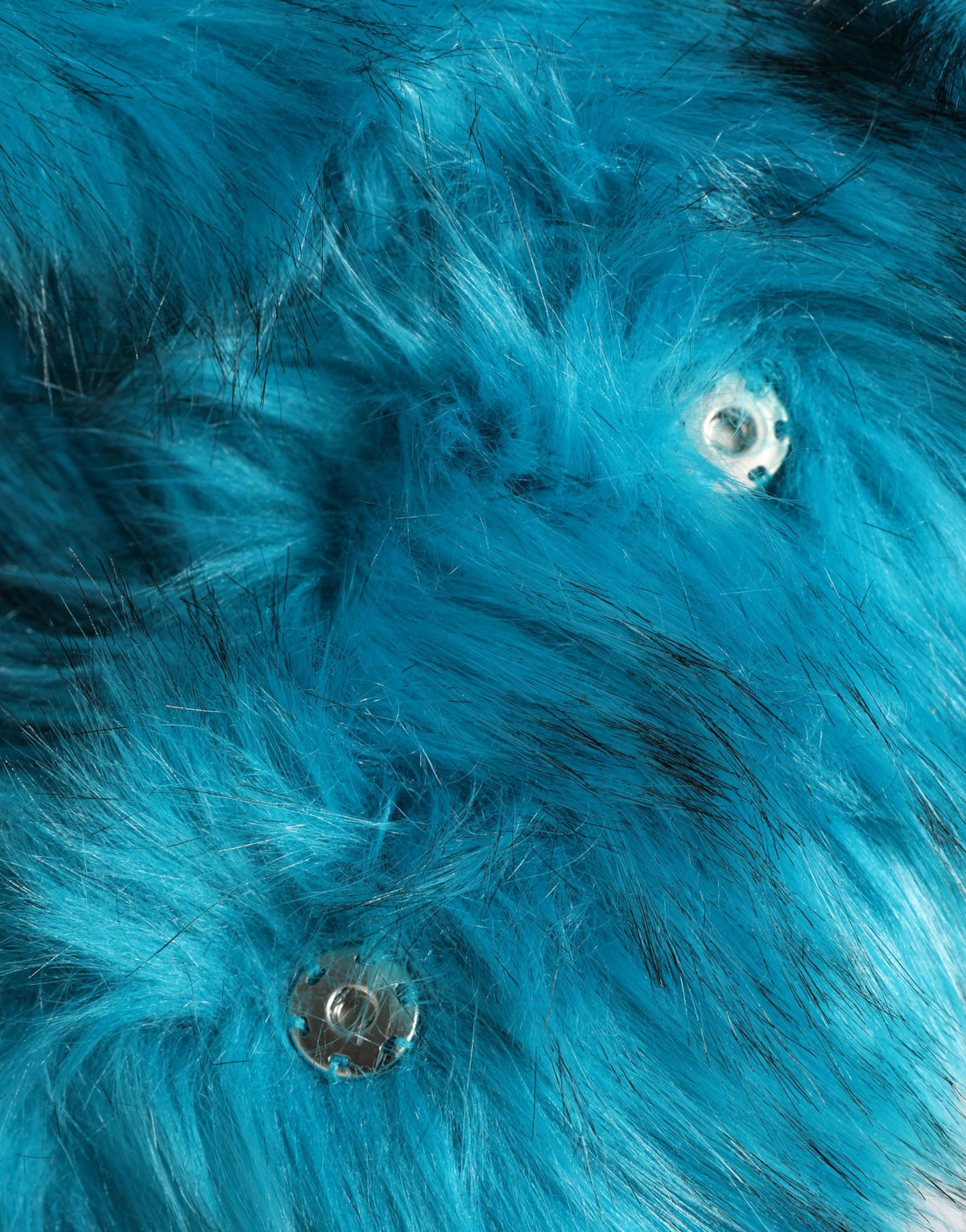 Indulge in the exquisite Dolce & Gabbana Blue Modacrylic Fur Bucket Hat, a luxurious statement piece crafted in Italy, blending warmth and elegance for the discerning connoisseur.