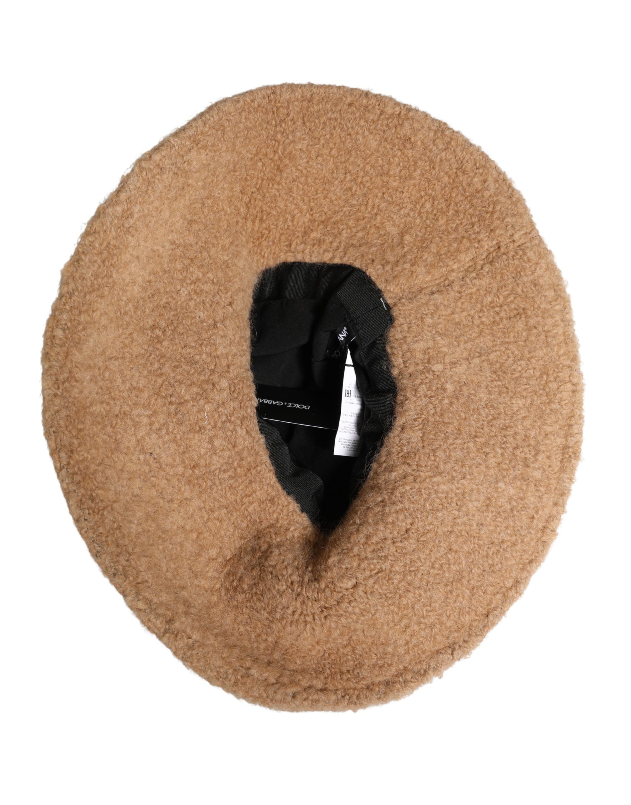 Indulge in the exquisite Dolce & Gabbana Beige Virgin Wool Capello Hat, a masterpiece of Italian craftsmanship that elevates your winter elegance with timeless allure.