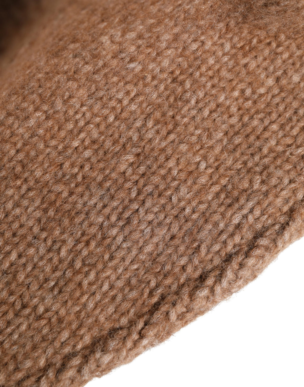 Indulge in the exquisite Dolce & Gabbana Brown Llama Wool Knitted Capello Hat, a luxurious blend of warmth and elegance, crafted in Italy for discerning tastes.