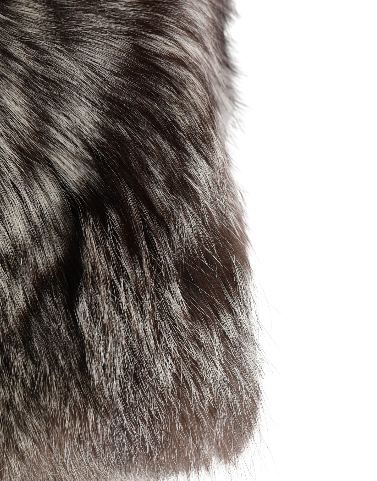 Indulge in the exquisite Dolce & Gabbana Brown Faux Fur Capello Hat, a masterpiece of Italian craftsmanship that embodies timeless elegance and luxurious allure.