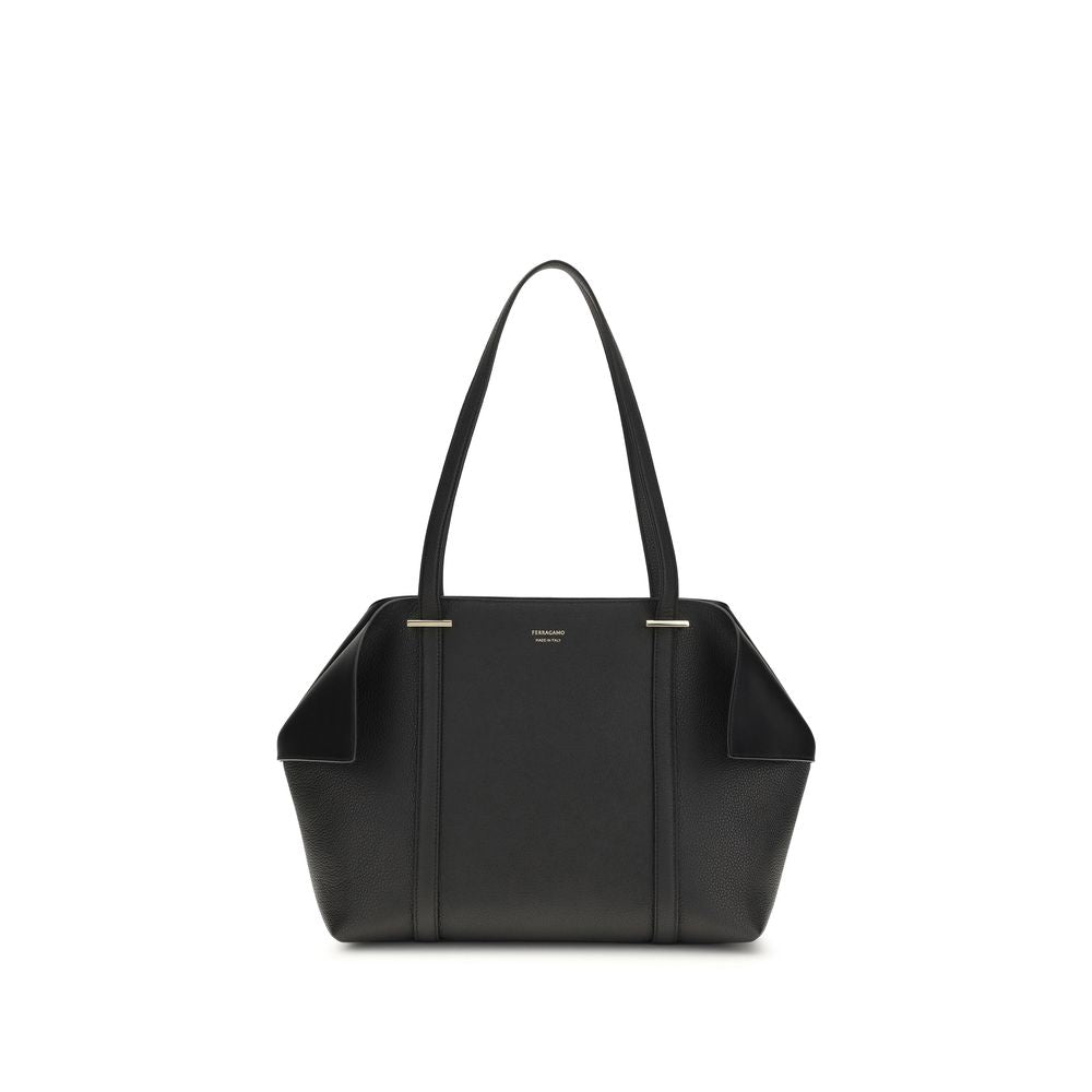 Elevate your everyday elegance with the Ferragamo Black Calf Leather Bos Taurus Shoulder Bag, a timeless masterpiece of Italian craftsmanship designed for the discerning individual.