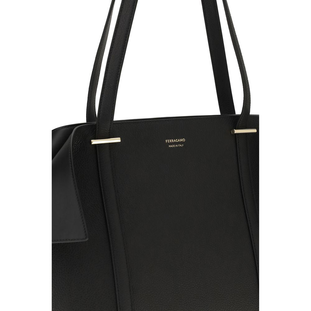 Discover the Ferragamo Black Calf Leather Bos Taurus Shoulder Bag, a masterpiece of Italian craftsmanship, blending luxury and practicality for the discerning individual.