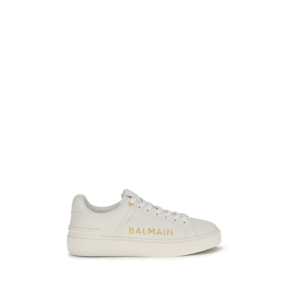 Indulge in the exquisite craftsmanship of Balmain White Calf Leather Bos Taurus Low Top Sneakers, where luxury meets timeless elegance for the discerning individual.