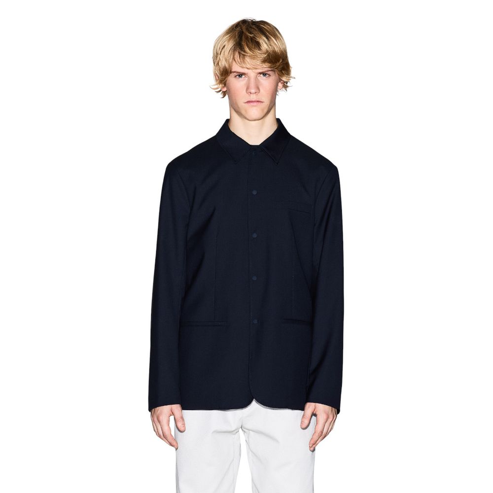 Elevate your wardrobe with the Armani Exchange Black Polyester Blazer, a fusion of luxury and comfort, crafted for timeless sophistication and effortless elegance.