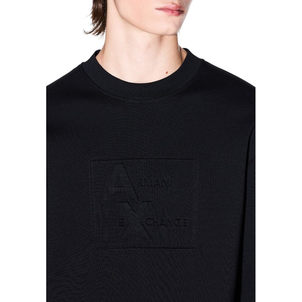 Elevate your wardrobe with the Armani Exchange Black Cotton Sweatshirt from the FW25 collection, a luxurious blend of comfort and sophistication for the discerning individual.