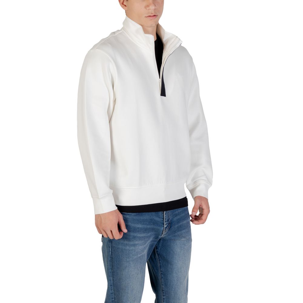 Indulge in the refined elegance of the Armani Exchange Cream Cotton Sweatshirt, crafted for those who embody luxury and sophistication in every moment.