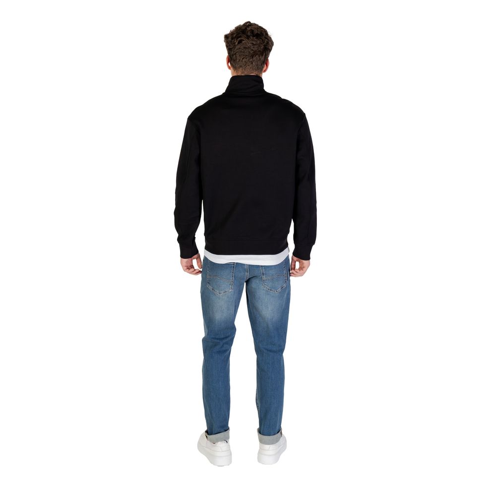 Elevate your casual wardrobe with the Armani Exchange Black Cotton Sweatshirt, crafted from a luxurious blend of cotton and elastane for refined comfort and modern sophistication.