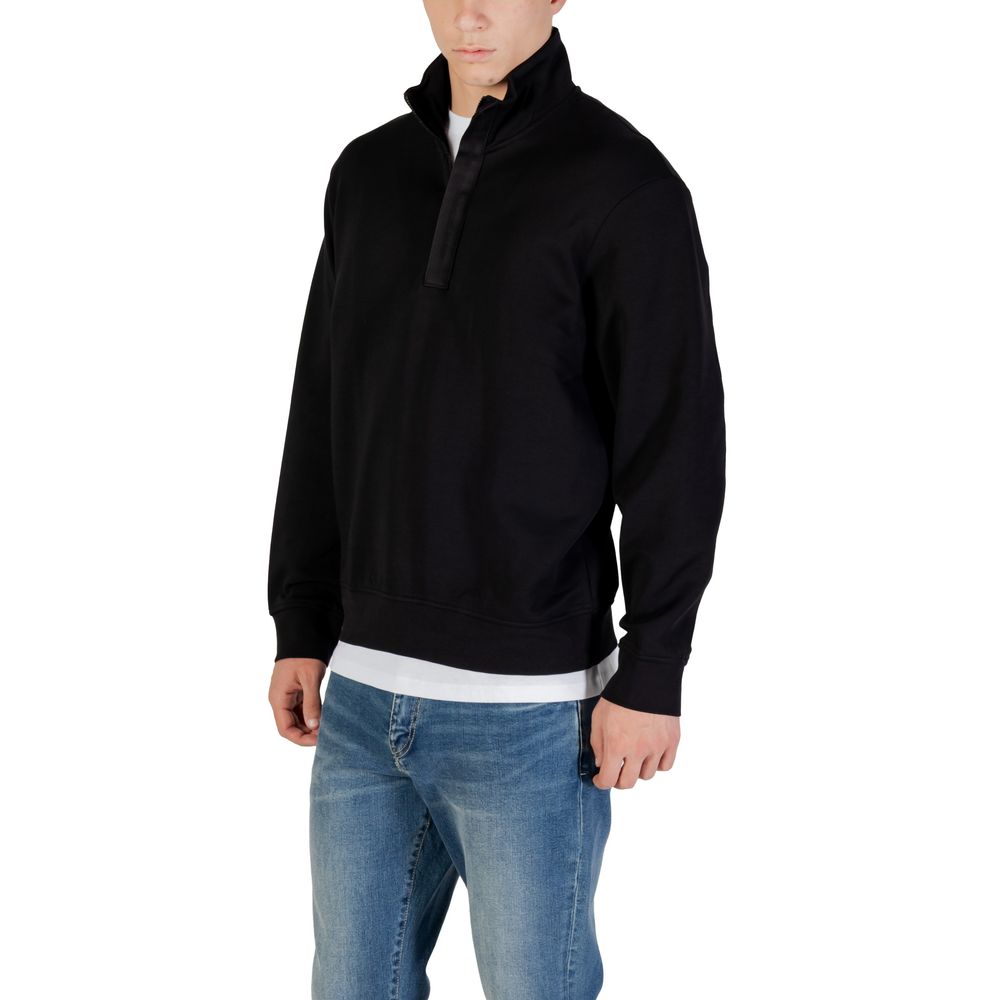 Elevate your wardrobe with the Armani Exchange Black Cotton Sweatshirt, a luxurious blend of cotton and elastane, designed for refined comfort and modern sophistication.