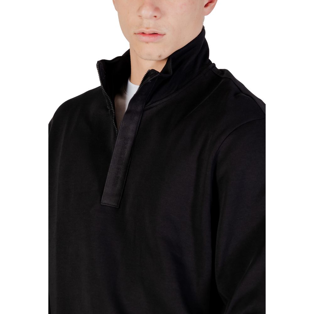Elevate your casual wardrobe with the Armani Exchange Black Cotton Sweatshirt, crafted from a luxurious blend for refined comfort and modern sophistication.