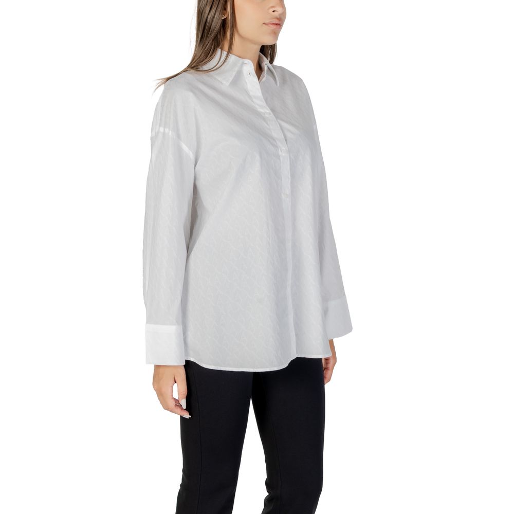Elevate your wardrobe with the Armani Exchange White Cotton Blouse, a luxurious blend of comfort and elegance, perfect for sophisticated occasions and casual outings.