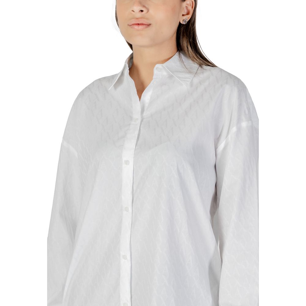 Elevate your style with the Armani Exchange White Cotton Blouse, a luxurious blend of comfort and elegance, perfect for any sophisticated occasion.